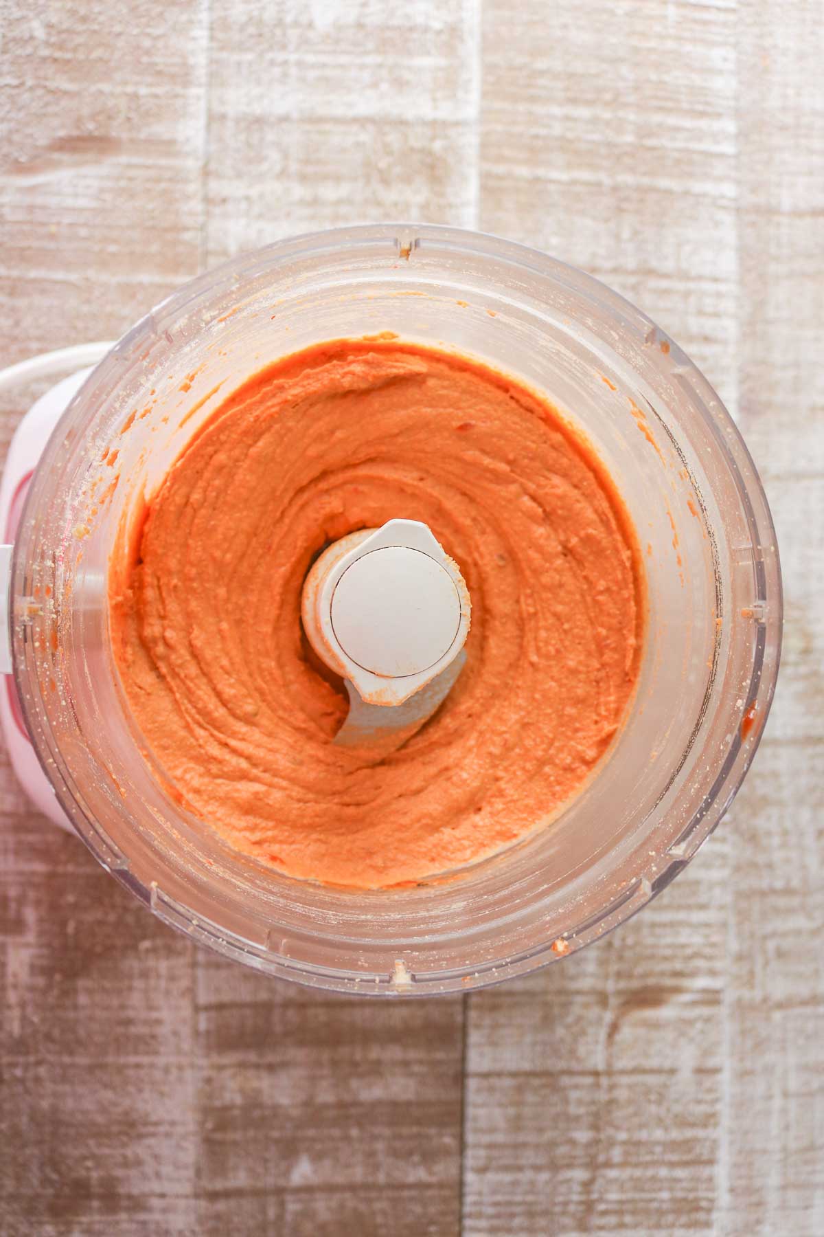 Flavoured hummus in a food processor.