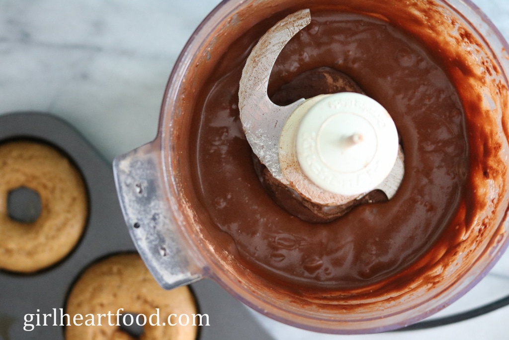 Chocolate peanut butter glaze in a small food processor.