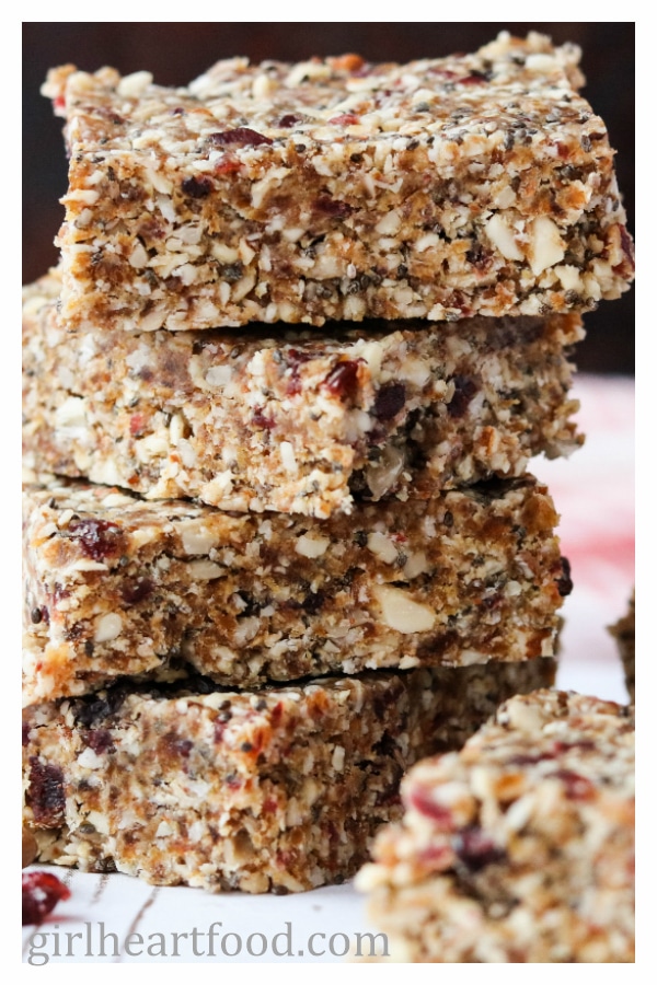 Close up of a stack of four homemade granola bars.