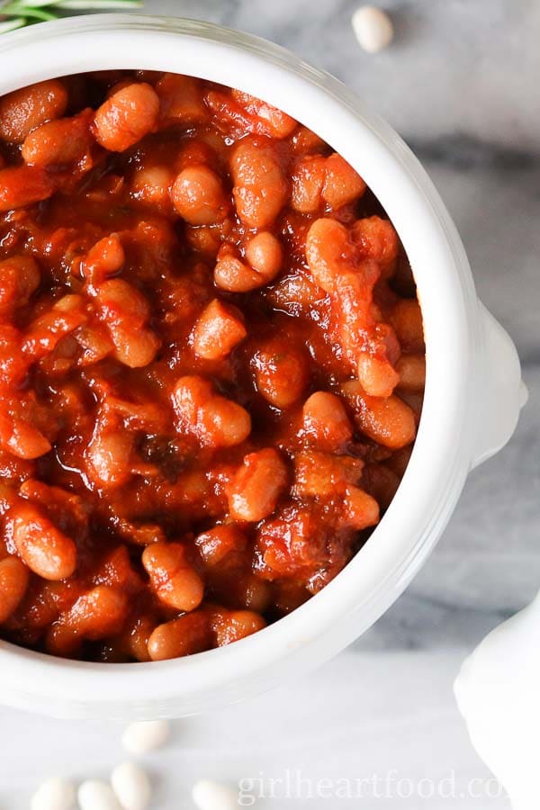 A close-up of a bowl of homemade baked beans.