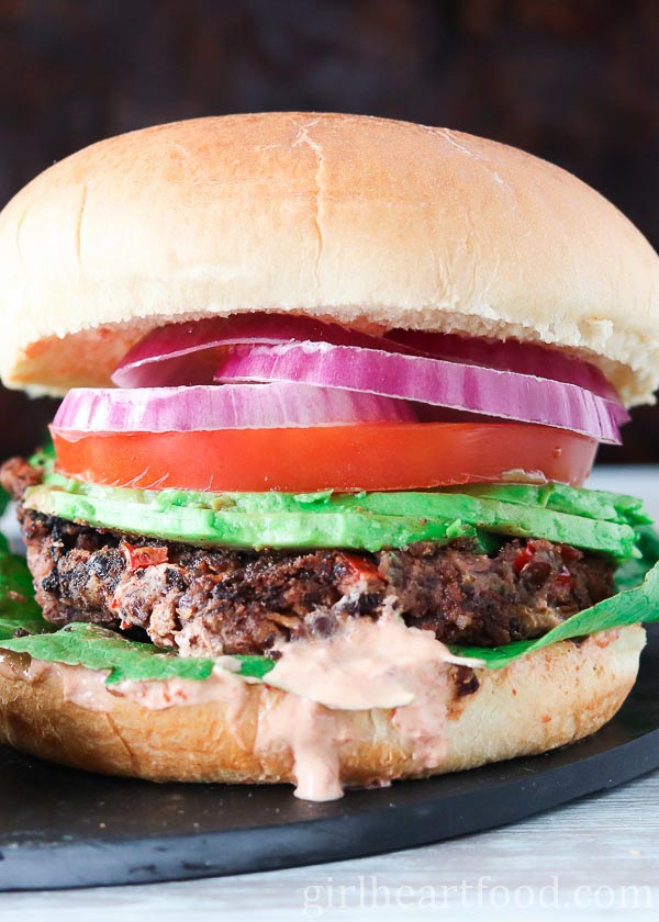 Black bean burger with toppings.