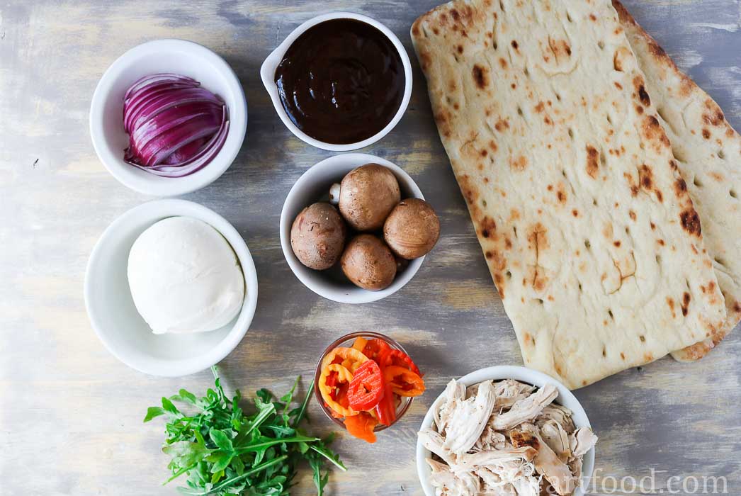 Ingredients for a BBQ chicken flatbread pizza recipe.