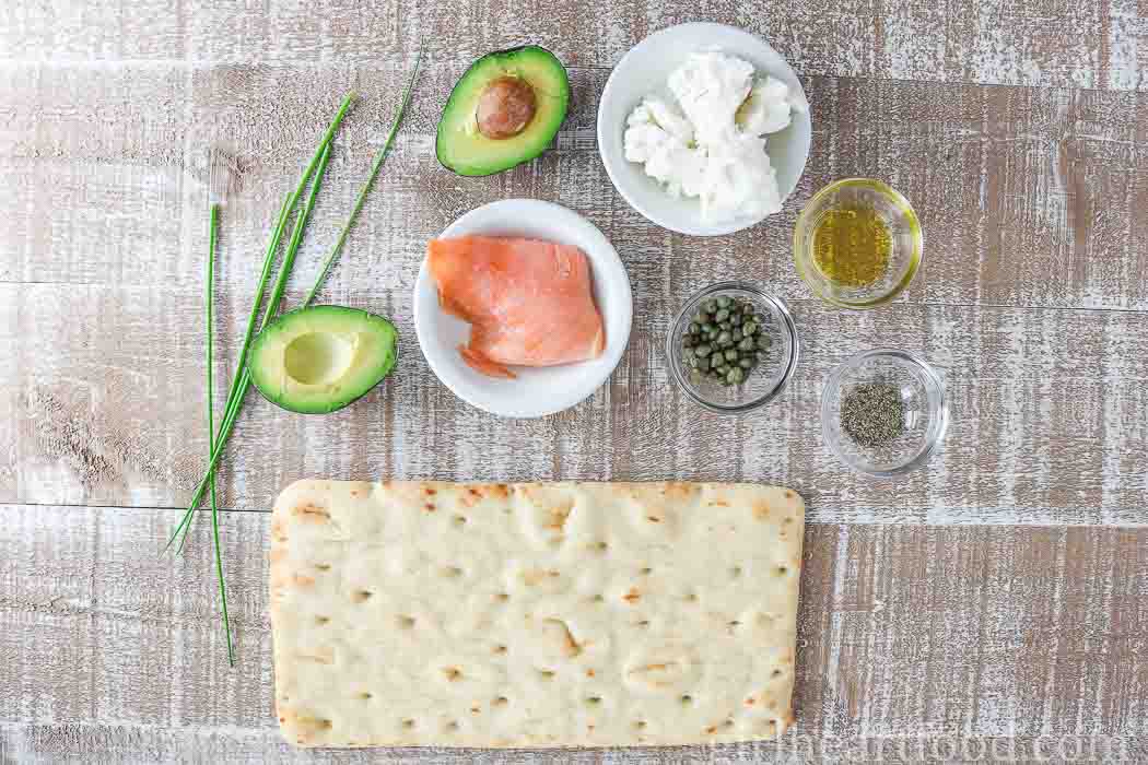 Ingredients for an avocado and smoked salmon appetizer recipe.