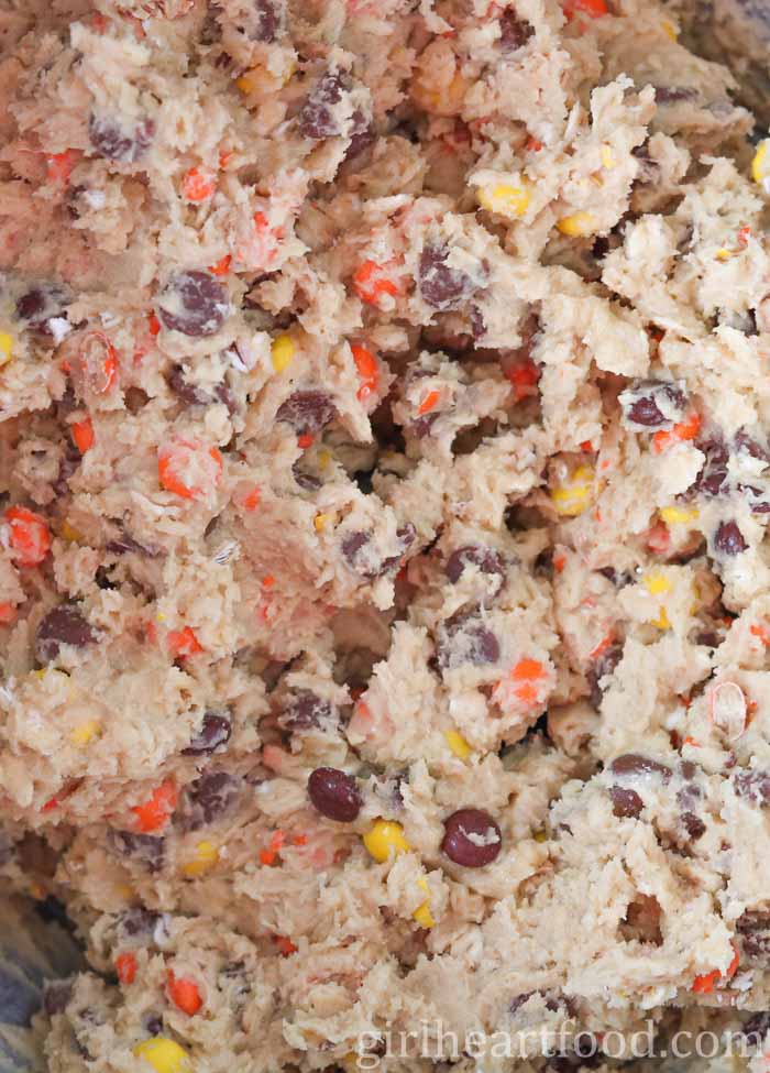 Close-up of cookie batter in a mixing bowl.