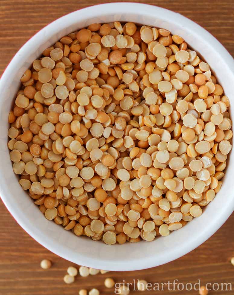 Bowl of dried yellow split peas.