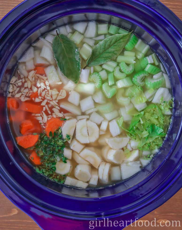 Ingredients for soup in the slow cooker before being cooked.