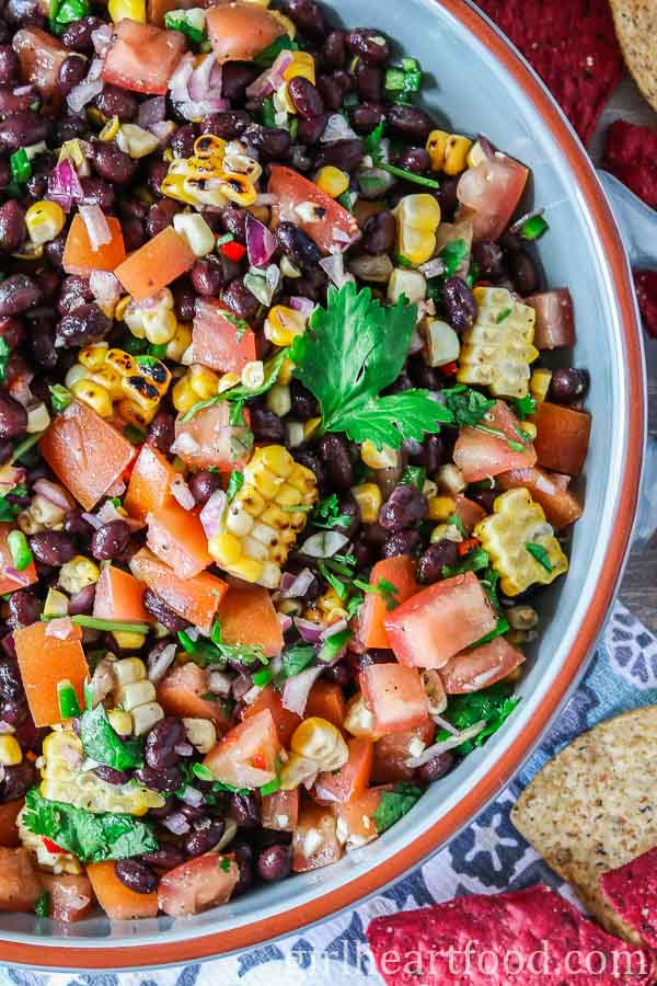 Close-up of black bean and corn salsa in a bowl.