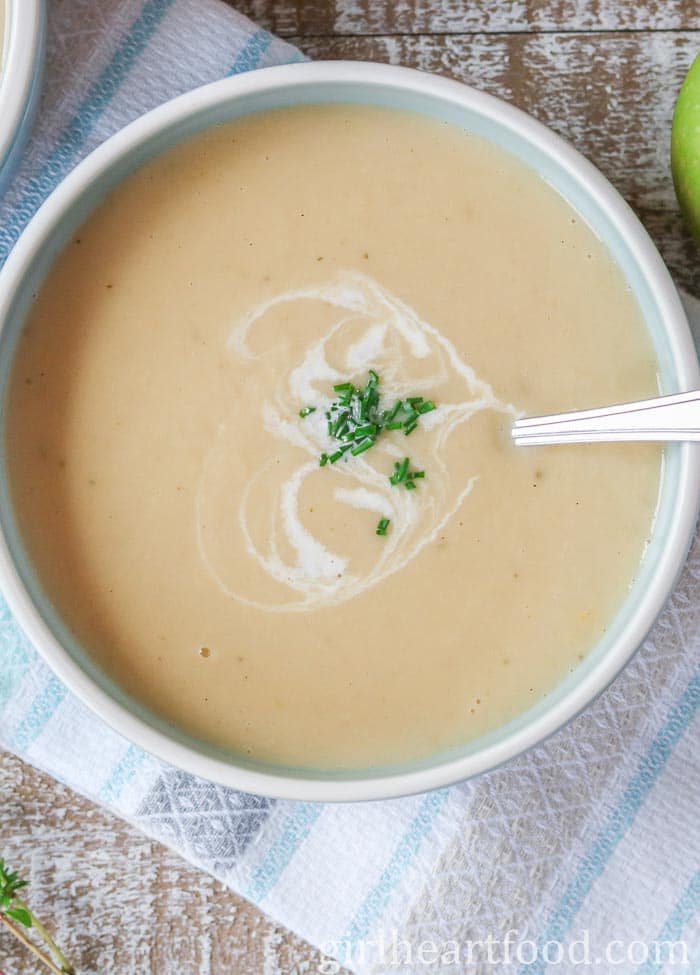 Bowl of creamy parsnip apple soup.