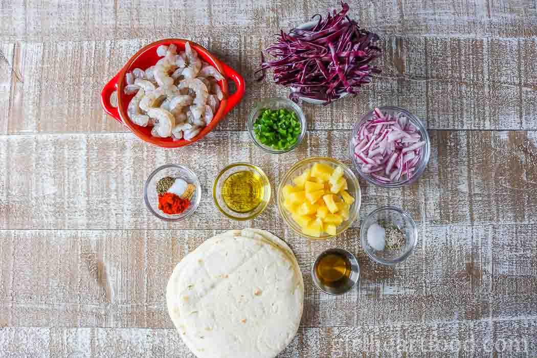 Ingredients for shrimp tacos with coleslaw.