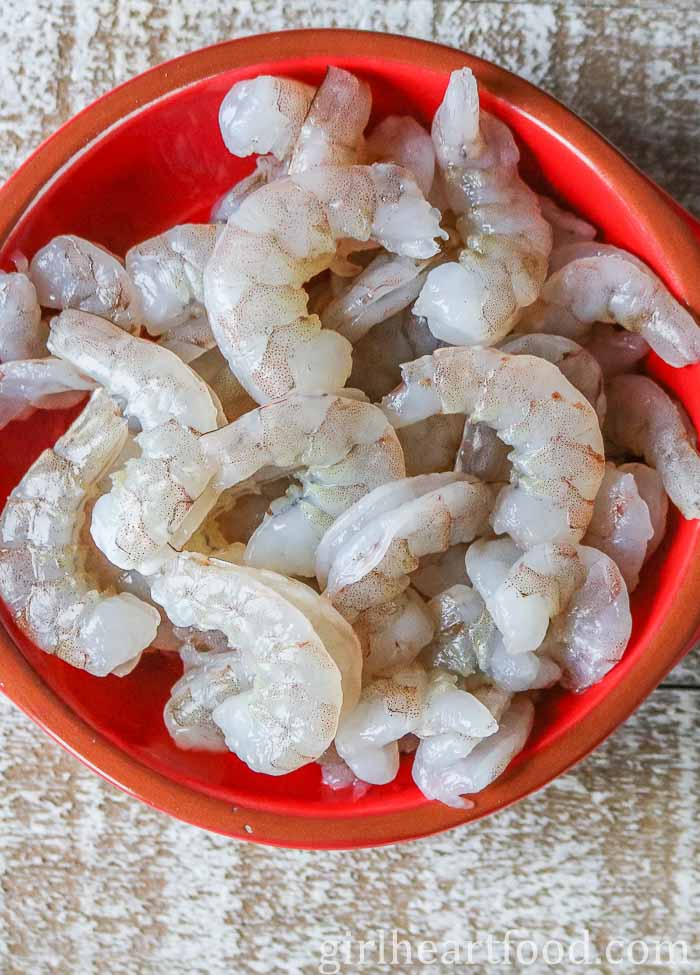 Bowl of raw shrimp.