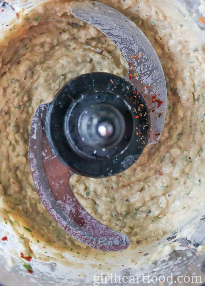 Creamy bean dip in a food processor.