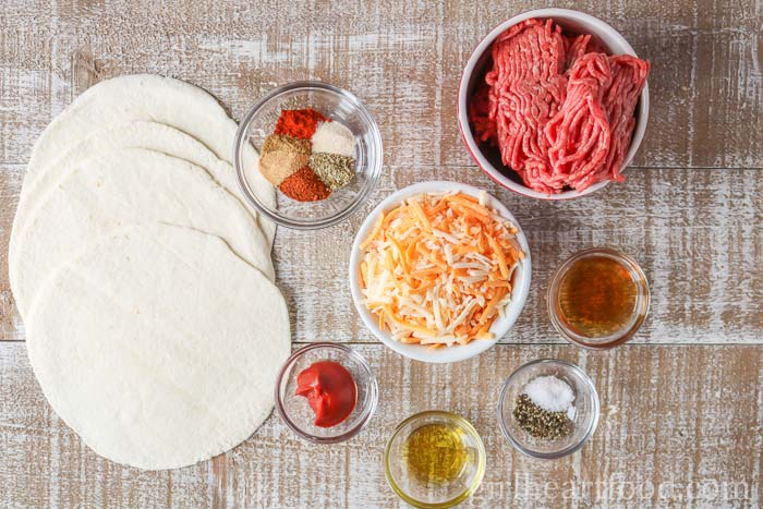 Ingredients for ground beef quesadillas with cheese.