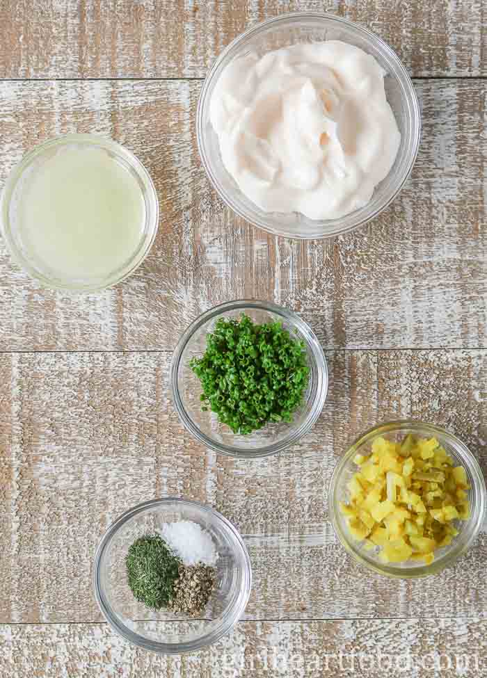 Ingredients for a homemade tartar sauce recipe.