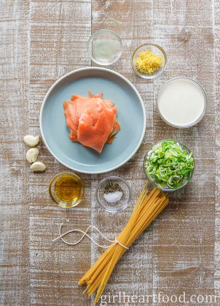 Ingredients for a creamy pasta recipe with smoked salmon.