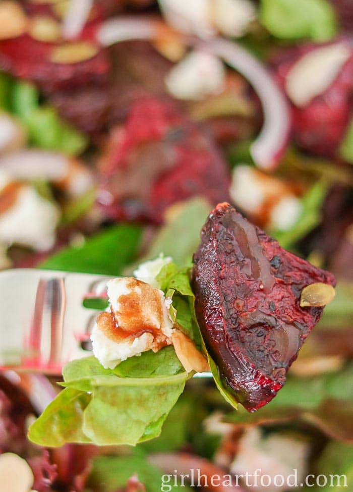 Forkful of roasted beet salad.