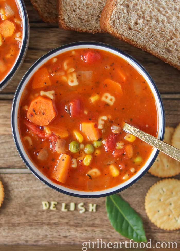 Bowl of vegetable alphabet soup.