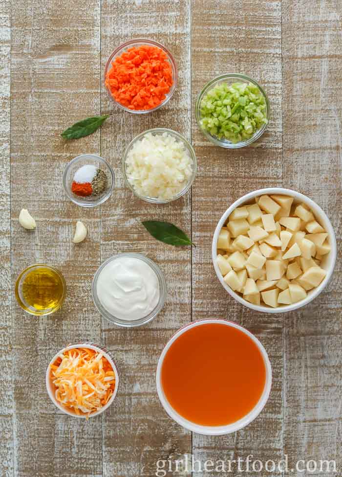 Ingredients for a cheese and potato soup recipe.