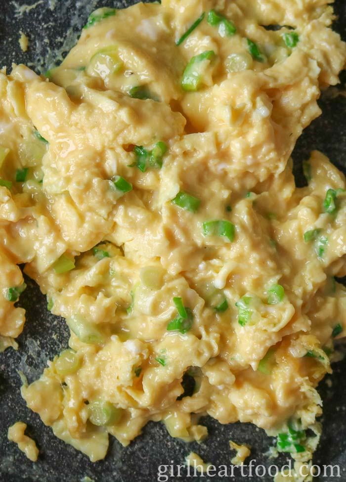 Scrambled eggs with green onion.