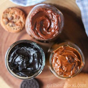 Three jars of homemade cookie spread, each a different flavour.