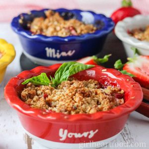 Small dishes of strawberry rhubarb crisp.