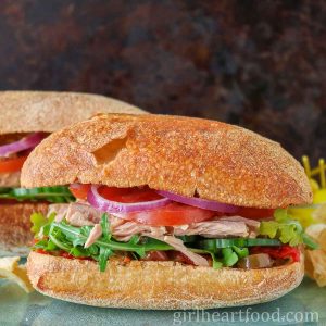Tuna vegetable sandwich on ciabatta bun.