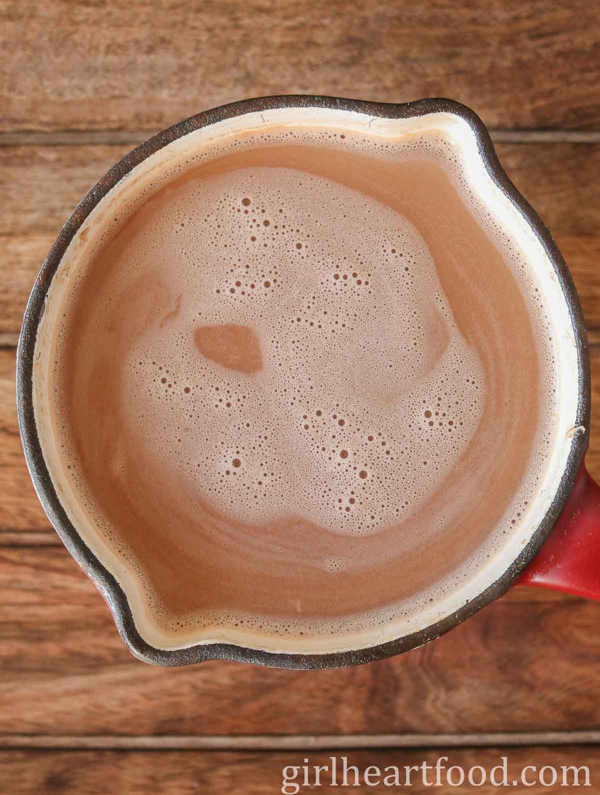 Hot chocolate in a saucepan.