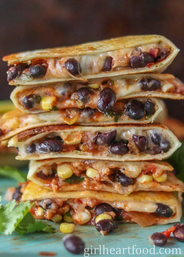 Stack of six black bean quesadillas.