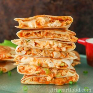 Stack of seven buffalo chicken quesadillas.