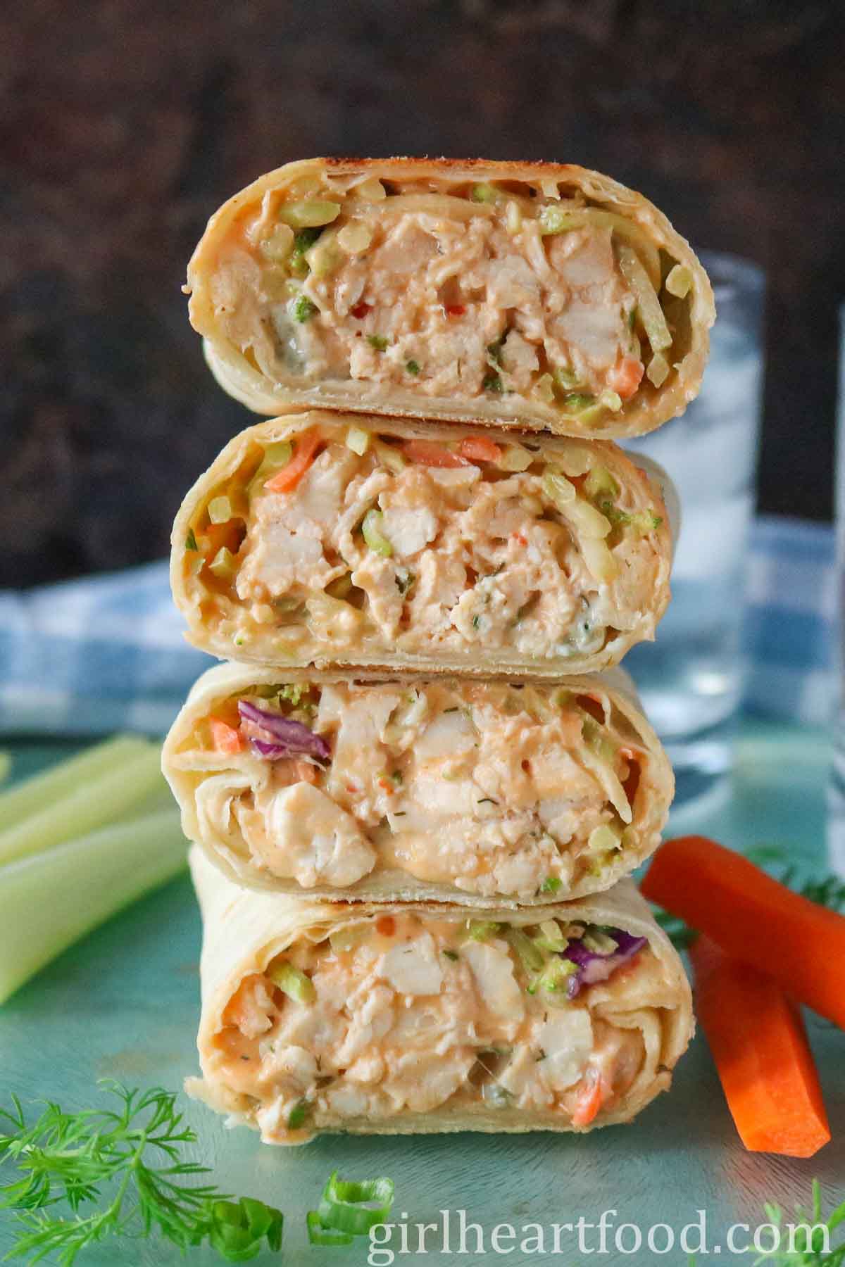 Stack of four buffalo chicken wraps.