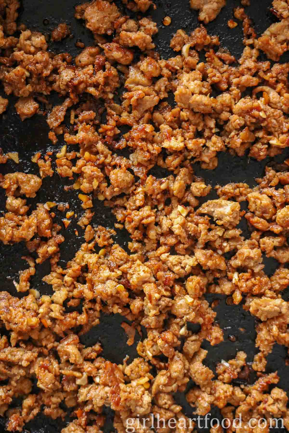 Close-up of cooked ground turkey in a skillet.