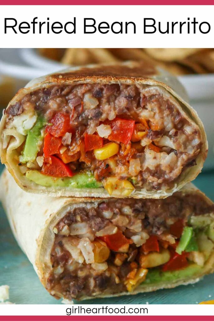 Close-up of a stack of two halves of a refried bean burrito.