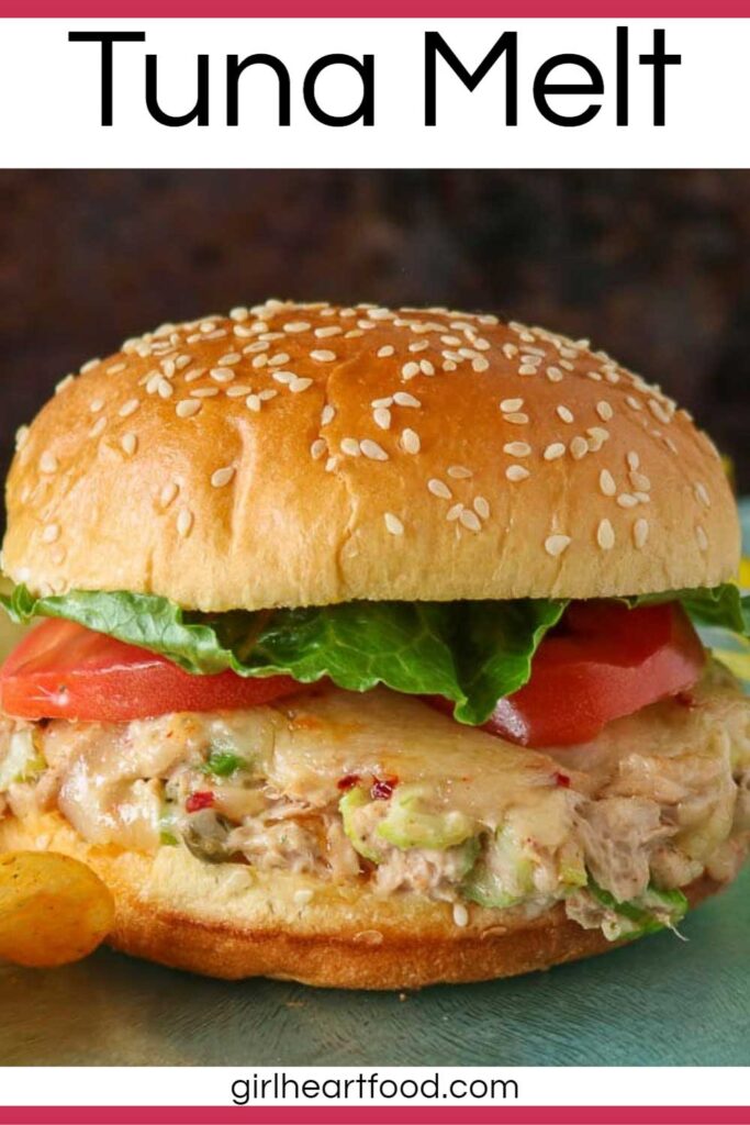 Tuna melt sandwich with lettuce and tomato.