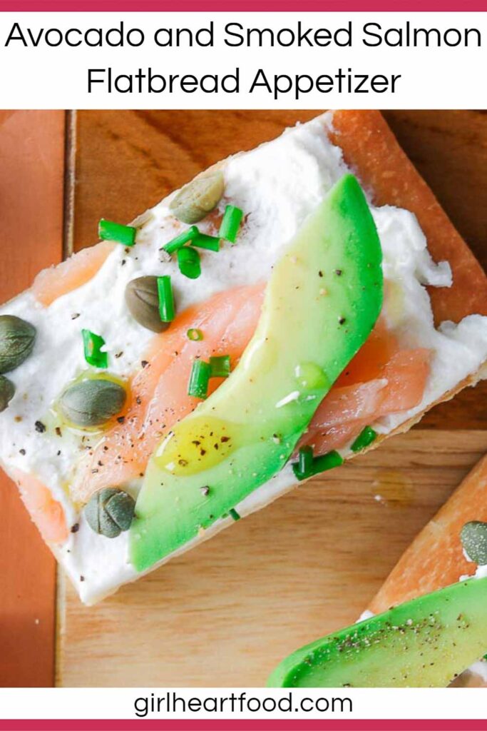 Close-up of a piece of avocado and smoked salmon flatbread.
