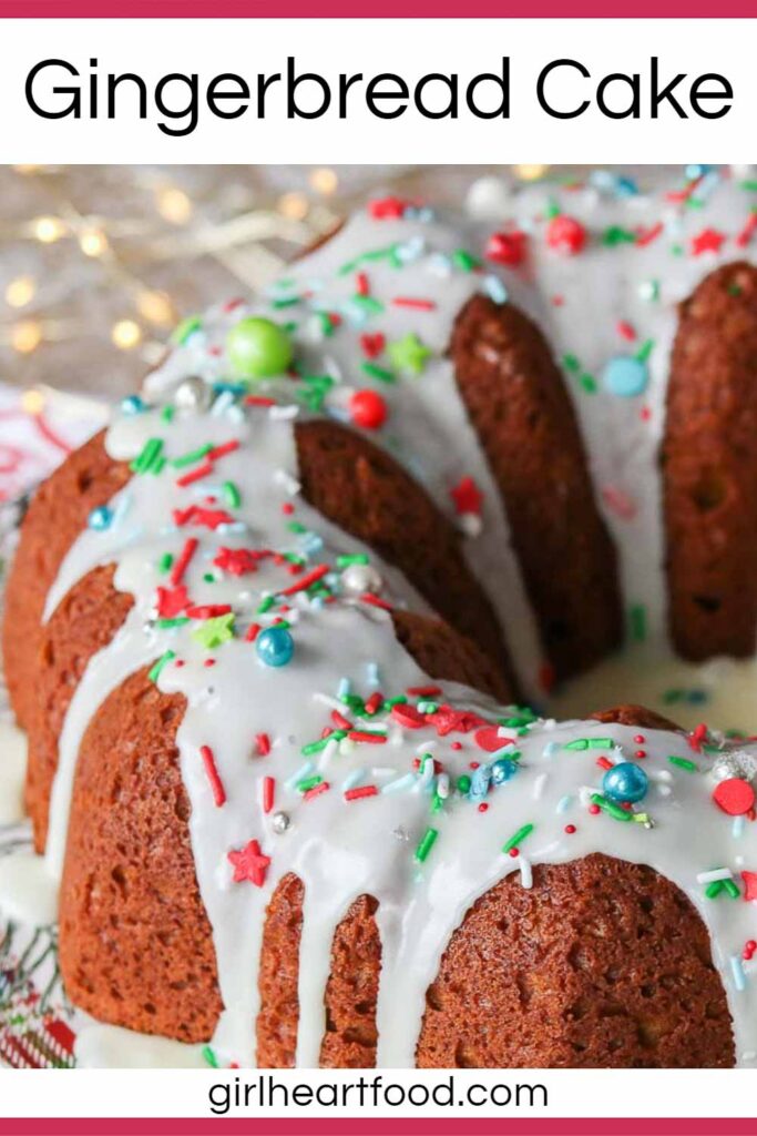 A gingerbread cake with an icing sugar glaze and sprinkles.