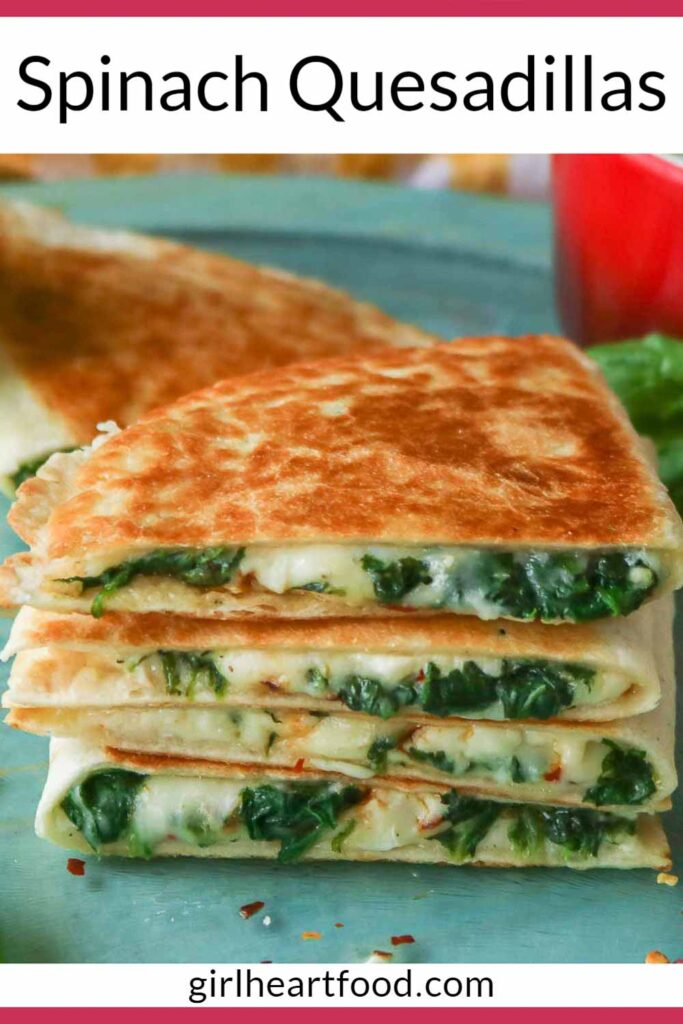 Stack of four cheesy spinach quesadillas.