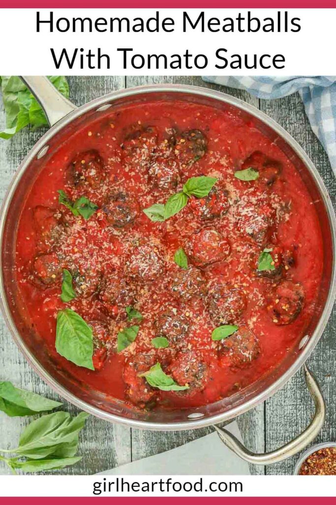 Pan of baked meatballs in tomato sauce.