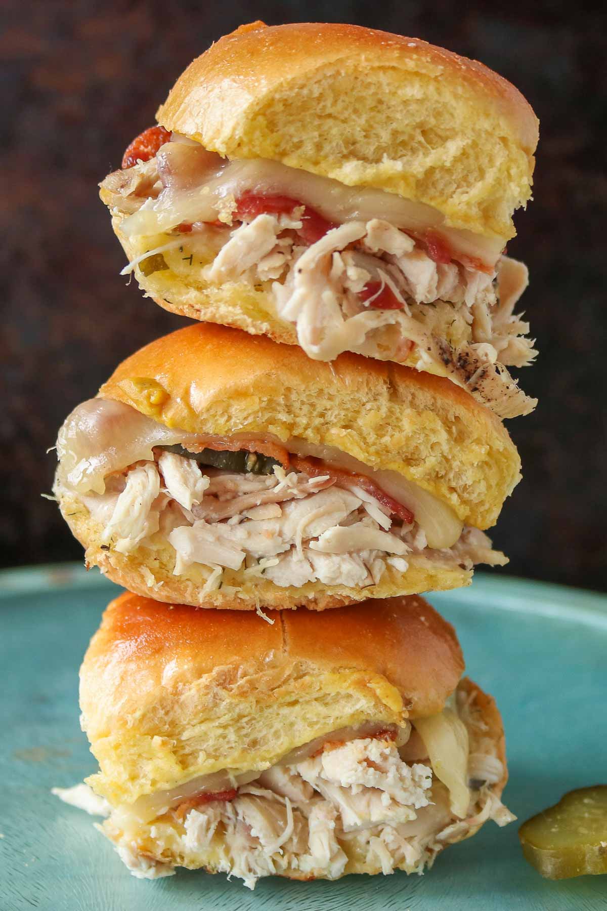 Stack of three chicken bacon ranch sliders.