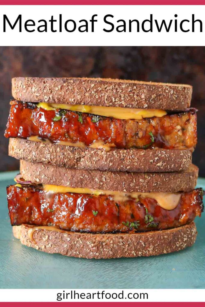 Stack of two meatloaf sandwiches.