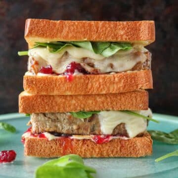 Stack of two turkey meatloaf sandwiches.