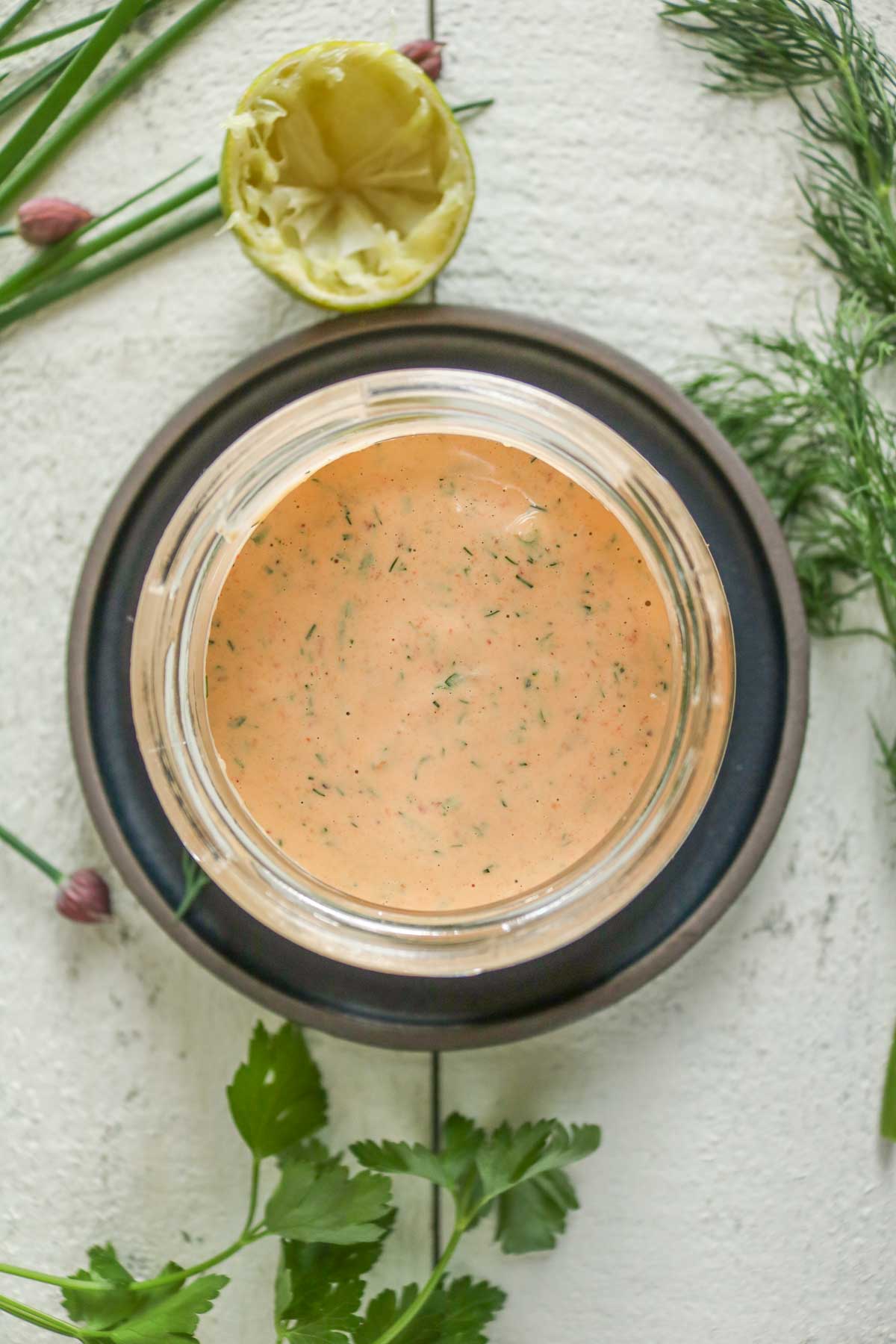 Overhead shot of a jar of chipotle ranch dressing.