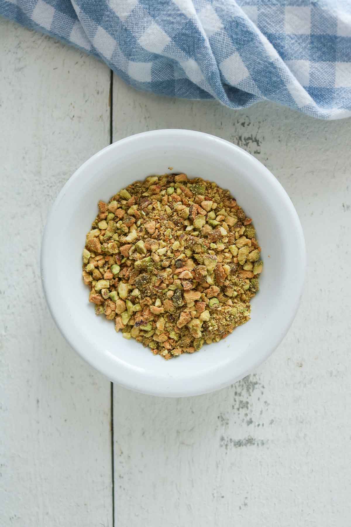 Small bowl of chopped pistachios.