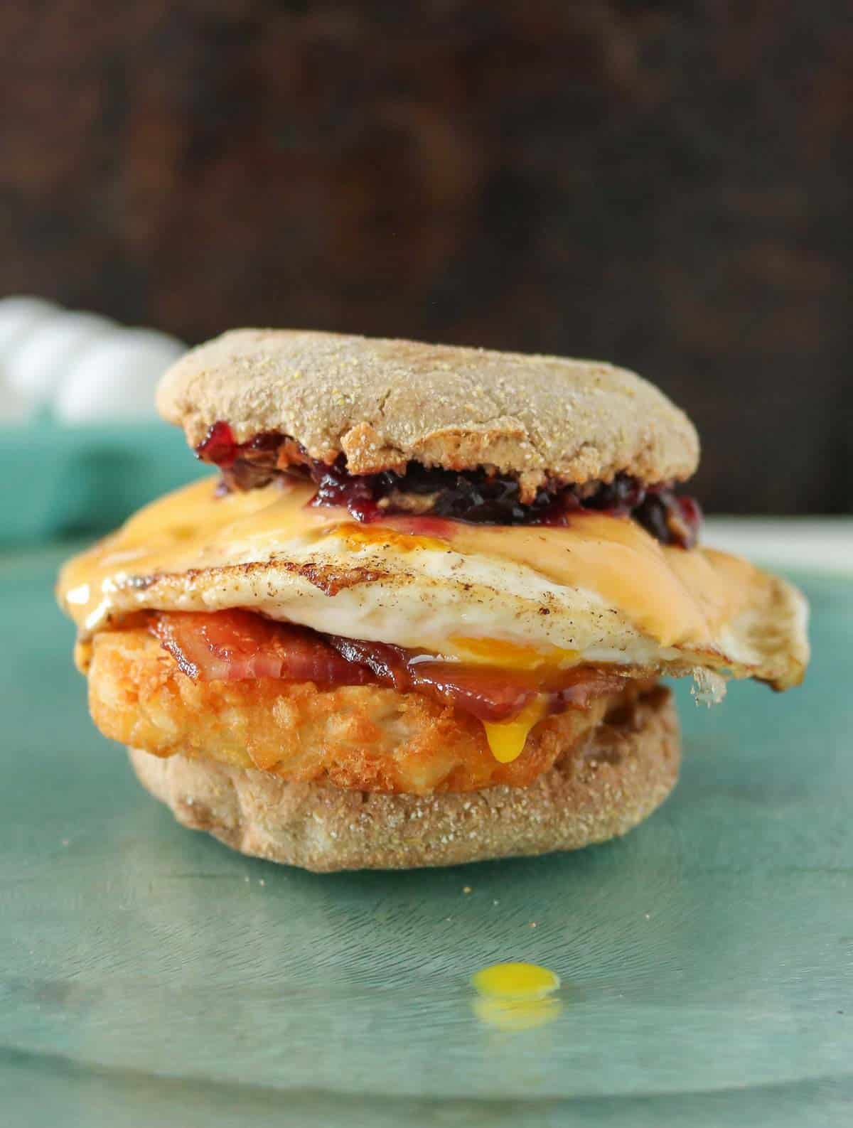 Bacon and egg hash brown breakfast sandwich.