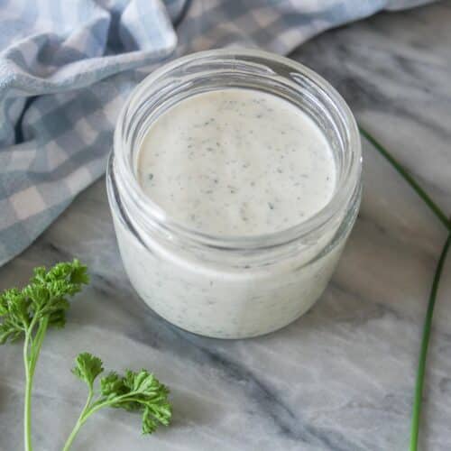 Homemade ranch dressing in a jar.