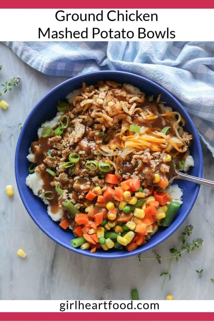 Ground chicken mashed potato bowl with a spoon.