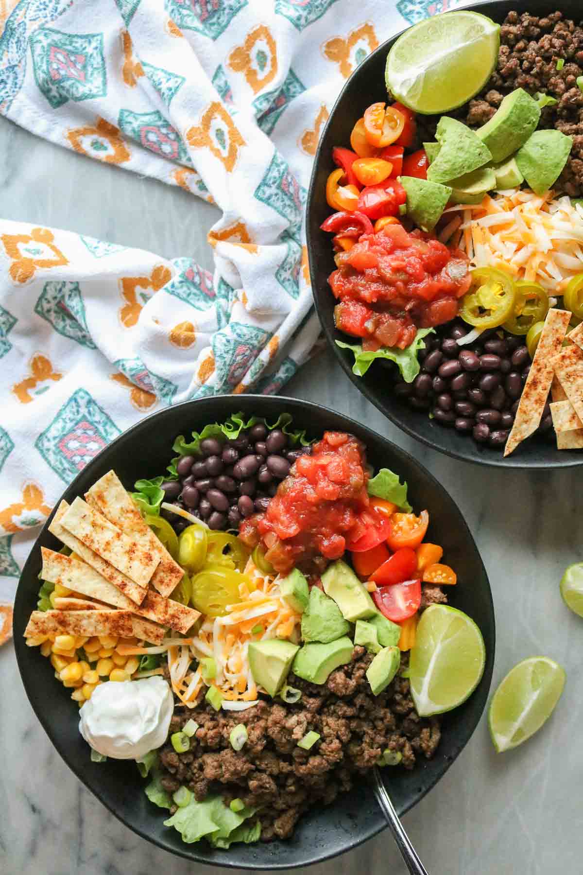 Two bowls of taco salad.
