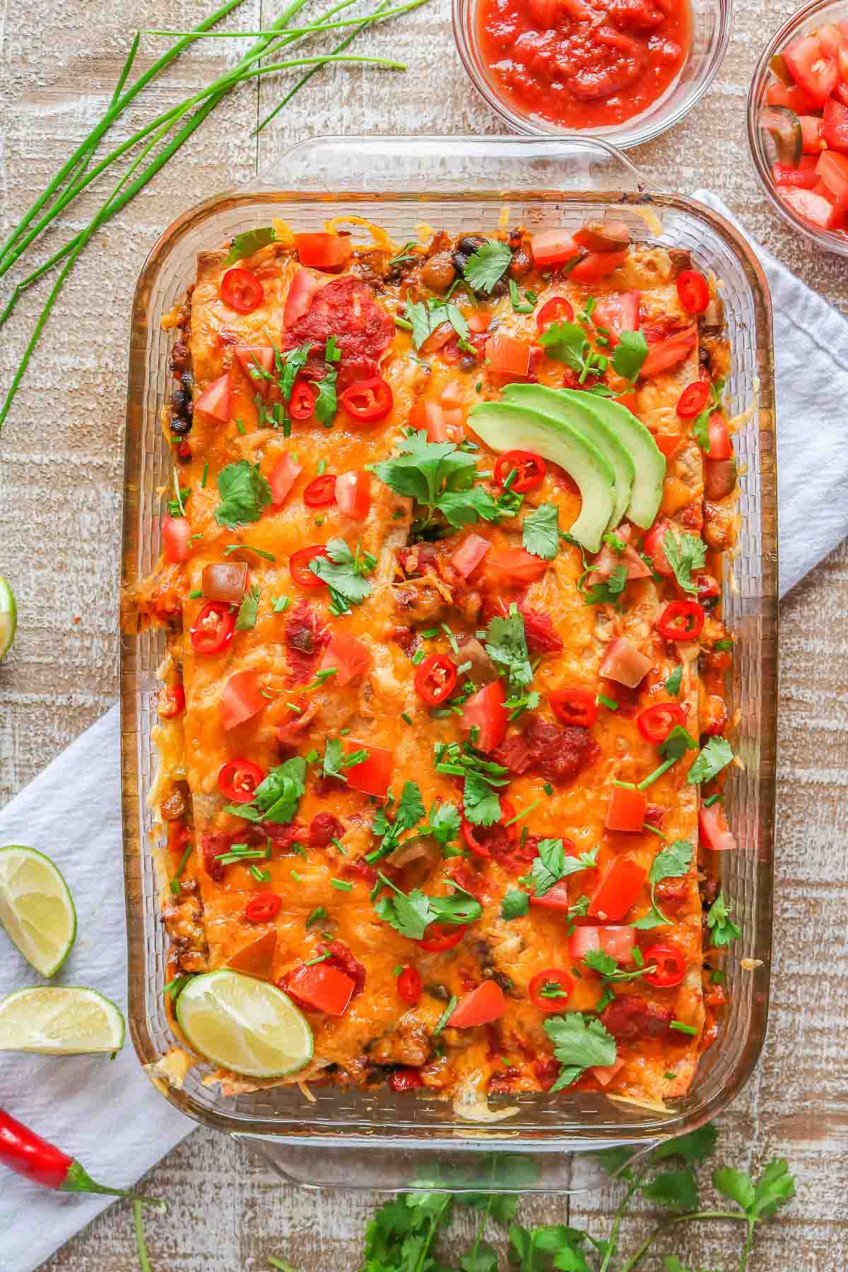 Turkey taco casserole garnished with toppings.