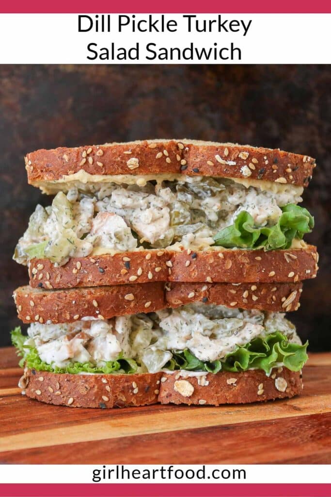 Stack of two halves of a dill pickle turkey salad sandwich.